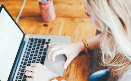 Young woman working at laptop