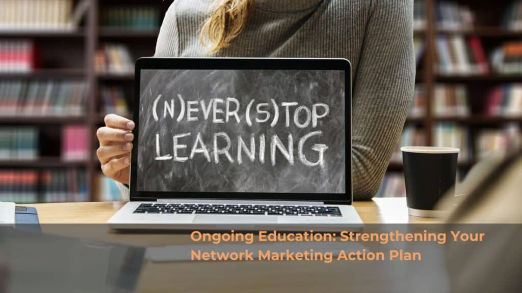 Laptop screen with the words "Never Stop Learning". Ongoing Education: Strengthening Your Network Marketing Action Plan