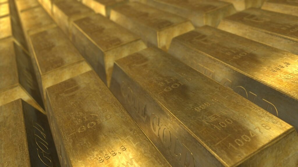 Picture of gold bars depicting the question "how does gold do in a recession?"