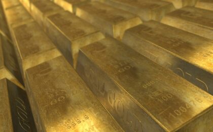 Picture of gold bars depicting the question "how does gold do in a recession?"