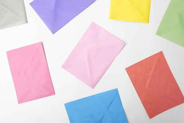 Colored stationary envelopes depicting the invite step to find prospects for mlm