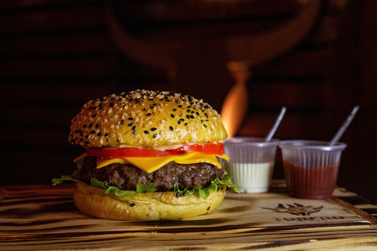 Hamburger on wooden serving tray 